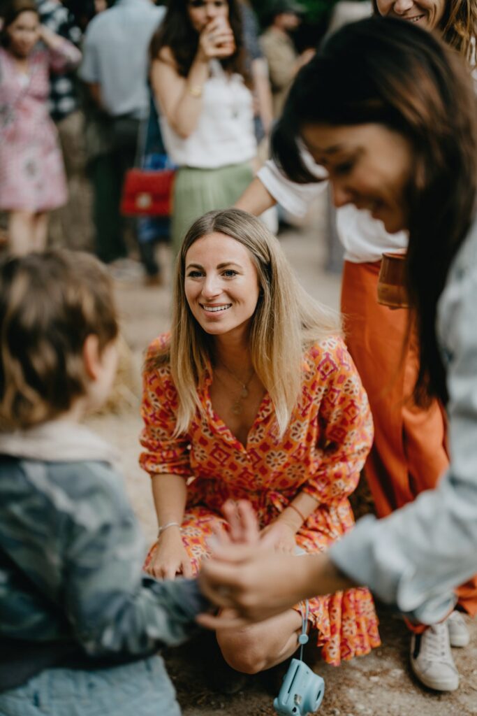 Conversation and smiles at a THE BALANCE summer gathering